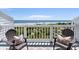 Beautiful balcony view with two chairs and a view of the beach at 7 Beach Club Villas, Isle of Palms, SC 29451