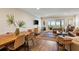 Open living and dining room area featuring wood floors at 7 Beach Club Villas, Isle of Palms, SC 29451