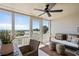 Cozy screened porch featuring comfortable seating and ocean views at 7 Beach Club Villas, Isle of Palms, SC 29451