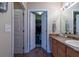 Functional bathroom featuring double doors to a walk-in closet at 7322 Stoney Moss Way, Hanahan, SC 29410