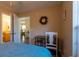 Cozy bedroom with a dedicated workspace and access to a full bathroom with a modern vanity at 7322 Stoney Moss Way, Hanahan, SC 29410