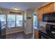 Bright kitchen with modern appliances, wooden cabinets, and a cozy breakfast nook at 7322 Stoney Moss Way, Hanahan, SC 29410