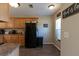 Functional kitchen with classic wooden cabinets, complete with modern appliances and ample counter space at 7322 Stoney Moss Way, Hanahan, SC 29410