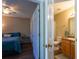 Comfortable bedroom connected to ensuite bathroom, perfect for relaxation and privacy at 7322 Stoney Moss Way, Hanahan, SC 29410
