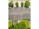 Aerial view of townhomes with well-maintained roofs, lush landscaping, and tree-lined streets at 854 Bibury Ct, Charleston, SC 29414