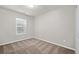 Neutral bedroom featuring carpet, a window, and freshly painted walls at 854 Bibury Ct, Charleston, SC 29414