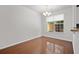 Bright dining area featuring hardwood floors and large window at 854 Bibury Ct, Charleston, SC 29414