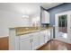 Kitchen featuring granite countertops, white cabinets, and stainless steel appliances at 854 Bibury Ct, Charleston, SC 29414