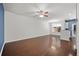 Spacious living room with hardwood floors, white walls, and ample natural light at 854 Bibury Ct, Charleston, SC 29414