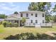 Expansive backyard with screened porch, wood deck, and plenty of space for outdoor activities at 9253 N Moreto Cir, Summerville, SC 29485