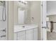 Bathroom features a white vanity, mirror, and walk in shower at 9253 N Moreto Cir, Summerville, SC 29485
