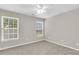 Carpeted bedroom with a ceiling fan and plenty of natural light at 9253 N Moreto Cir, Summerville, SC 29485