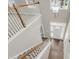 Bright foyer with hardwood floors, chandelier, staircase, and white front door at 9253 N Moreto Cir, Summerville, SC 29485