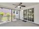 Covered porch with ceiling fan, concrete flooring, and sliding glass doors leading to the yard at 9253 N Moreto Cir, Summerville, SC 29485