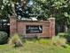 Elegant brick community entrance sign for Ashley Ridge, featuring manicured landscaping and a welcoming atmosphere at 9253 N Moreto Cir, Summerville, SC 29485