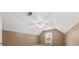 This bedroom features high ceilings, a ceiling fan, and a large window at 9616 Pebble Creek Blvd, Summerville, SC 29485