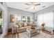 Inviting living room with natural light and comfortable seating arrangement at 9616 Pebble Creek Blvd, Summerville, SC 29485