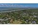 Stunning aerial view of property surrounded by lush greenery and waterfront views at 10 Chapman Ave, Isle of Palms, SC 29451