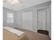 Bedroom with a large closet, carpet and a window providing natural light at 10 Chapman Ave, Isle of Palms, SC 29451
