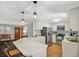 Clean kitchen featuring a breakfast bar and stainless steel appliances at 10 Chapman Ave, Isle of Palms, SC 29451