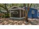 Screened porch and surrounding trees at 10 Chapman Ave, Isle of Palms, SC 29451