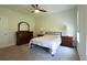 Simple bedroom featuring wood furnishings, carpeted floors, and neutral-colored walls at 103 Granton Edge Ln, Summerville, SC 29486