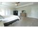 Spacious main bedroom featuring neutral carpet, a ceiling fan, and ample space for a bedroom with extra sitting area at 103 Granton Edge Ln, Summerville, SC 29486