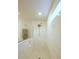 Bright shower featuring marble tile surround, glass enclosure, modern shower head and convenient built-in toiletry niche at 103 Granton Edge Ln, Summerville, SC 29486