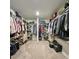 Large walk-in closet providing ample storage with organized shelving and hanging space for clothes, shoes, and accessories at 103 Granton Edge Ln, Summerville, SC 29486