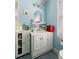 Cozy bathroom with blue walls, decorative mirror, and a charming vanity at 1067 Loyalist Ln, Mount Pleasant, SC 29464