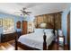 Beautiful bedroom featuring a tapestry, king-size bed, and natural light from the window at 1067 Loyalist Ln, Mount Pleasant, SC 29464