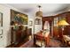 Charming dining room with hardwood floors and antique furniture at 1067 Loyalist Ln, Mount Pleasant, SC 29464