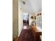 Hallway with a decorative rug, a window seat, and a glimpse into another room at 1067 Loyalist Ln, Mount Pleasant, SC 29464