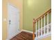 Bright entryway showcases a staircase with a modern railing and durable flooring at 112 Worthington Dr, Moncks Corner, SC 29461