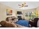 Cozy living room features a fireplace, comfortable seating, and large windows for natural light at 112 Worthington Dr, Moncks Corner, SC 29461