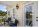 Cozy outdoor balcony with comfortable chairs, and a pleasant exterior view and shade at 123 Gaslight Blvd, Summerville, SC 29483