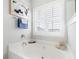 Soaking tub with tile surround and window, providing natural light and ventilation at 123 Gaslight Blvd, Summerville, SC 29483