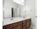 Bathroom features double vanity and large mirror at 123 Gaslight Blvd, Summerville, SC 29483