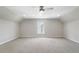 Bonus room with large window for ample natural light and a ceiling fan for added comfort at 123 Gaslight Blvd, Summerville, SC 29483