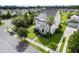 Two-story home with lush landscaping, a palm tree, and a well-maintained yard in a neighborhood at 123 Gaslight Blvd, Summerville, SC 29483