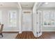 Bright foyer with hardwood floors, plantation shutters, and an open layout at 123 Gaslight Blvd, Summerville, SC 29483