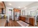 Modern kitchen with an open floor plan, stainless steel appliances, and ample counter space at 123 Gaslight Blvd, Summerville, SC 29483