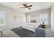 Relaxing bedroom featuring carpet floors, window shutters, ceiling fan and a cozy rug for comfort at 123 Gaslight Blvd, Summerville, SC 29483