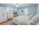 Cozy bedroom with a ceiling fan, comfortable bedding, and natural light at 131 Harvey Ave, Goose Creek, SC 29445