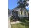 Charming single-Gathering home features light gray siding, yellow shutters, and a cozy front porch at 1346 Ellison Run, Charleston, SC 29412