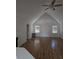 Spacious living room featuring vaulted ceilings, hardwood floors, and natural light from large windows at 1346 Ellison Run, Charleston, SC 29412
