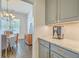 Kitchen view into the dining room featuring modern appliances and granite countertops for a sleek look at 139 Back Tee Cir, Summerville, SC 29485