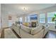 Open concept living space connecting kitchen, dining, and living areas for easy entertaining at 139 Back Tee Cir, Summerville, SC 29485