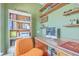 Cozy home office with custom shelving, a computer, and ample desk space at 139 Back Tee Cir, Summerville, SC 29485