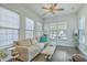Comfortable sunroom featuring plenty of natural light, cozy seating, and relaxing decor at 139 Back Tee Cir, Summerville, SC 29485